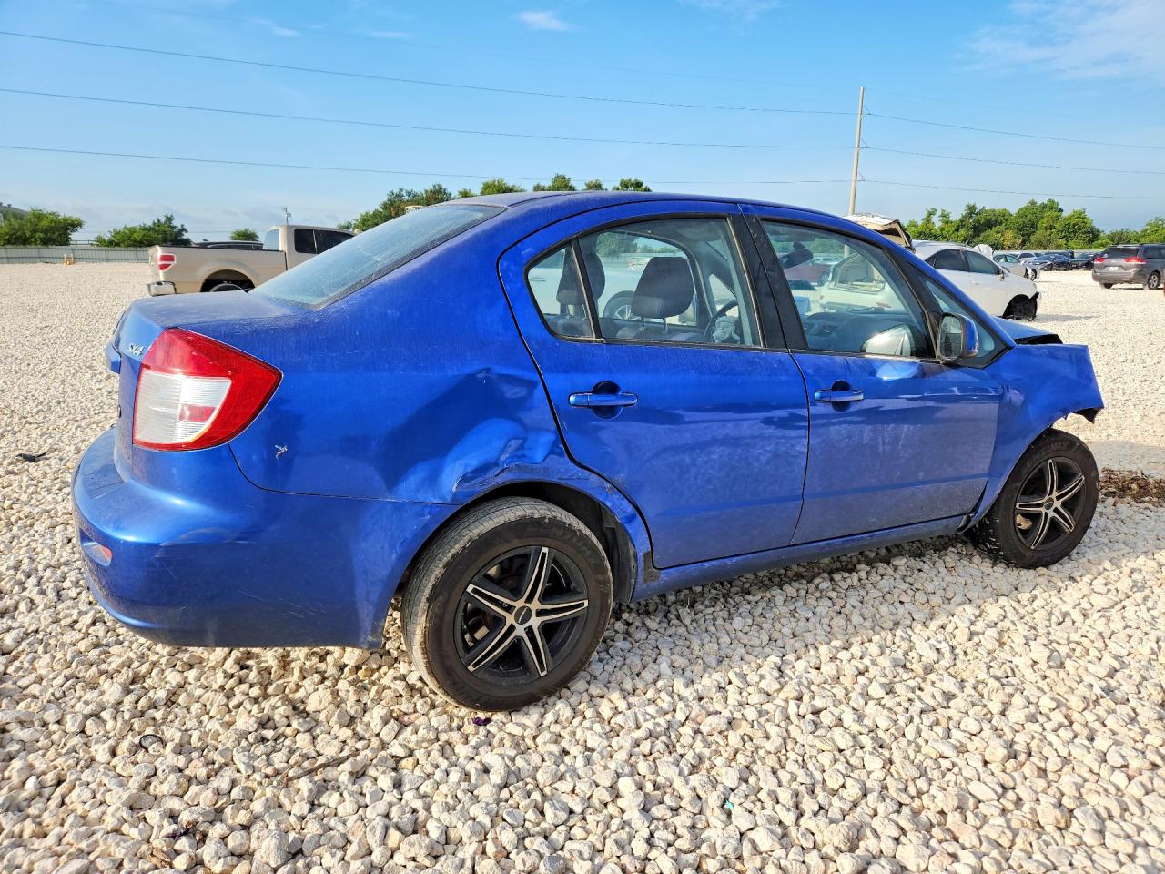 2013 Suzuki Sx4 Le Blue vin: JS2YC5A31D6100861