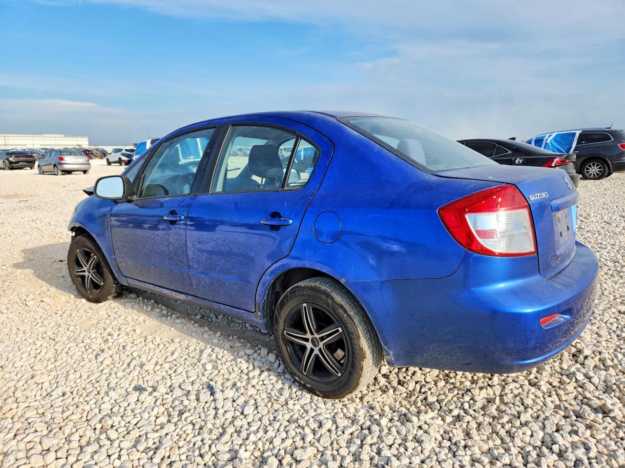 2013 Suzuki Sx4 Le Blue vin: JS2YC5A31D6100861