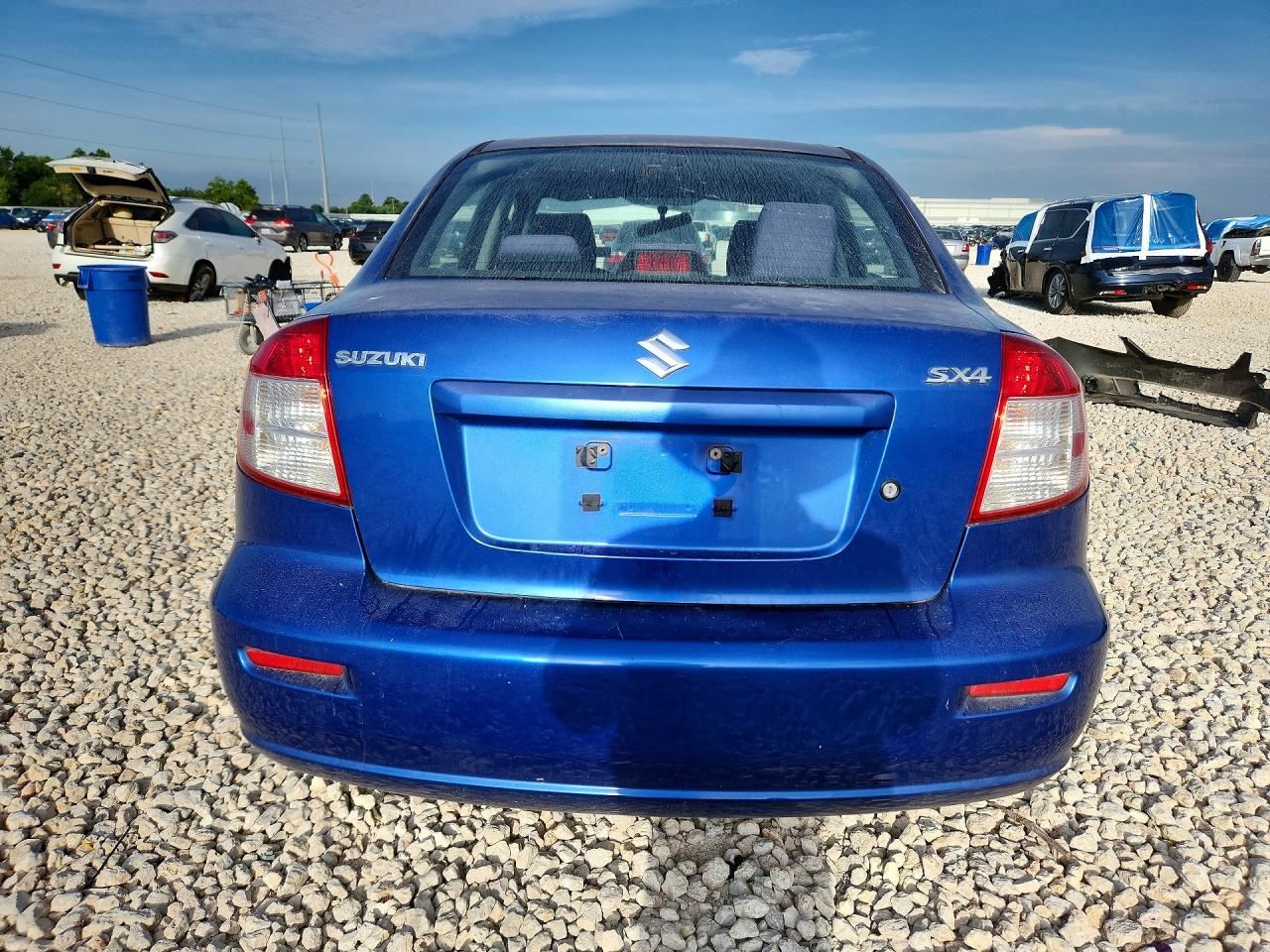 2013 Suzuki Sx4 Le Blue vin: JS2YC5A31D6100861