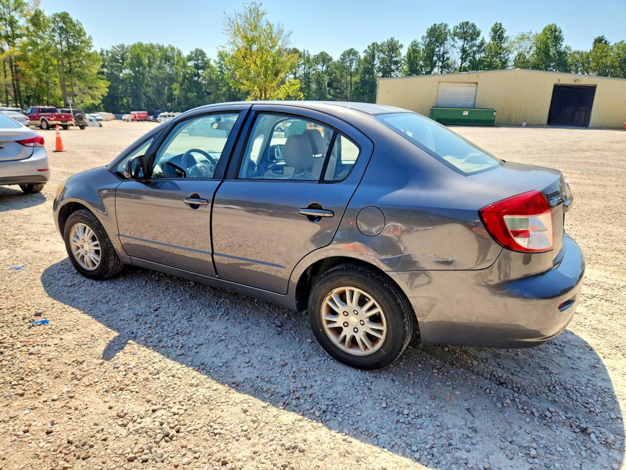 2012 Suzuki Sx4 Le Gray vin: JS2YC5A32C6300677