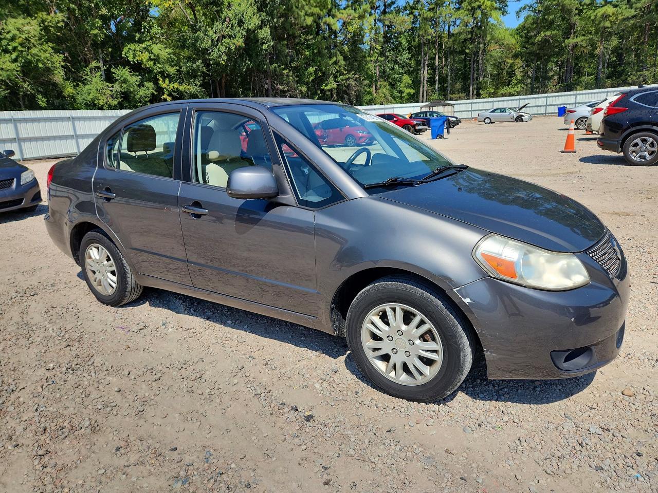 2012 Suzuki Sx4 Le Gray vin: JS2YC5A32C6300677