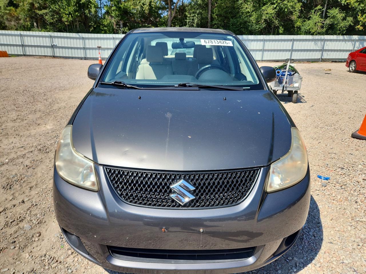 2012 Suzuki Sx4 Le Gray vin: JS2YC5A32C6300677