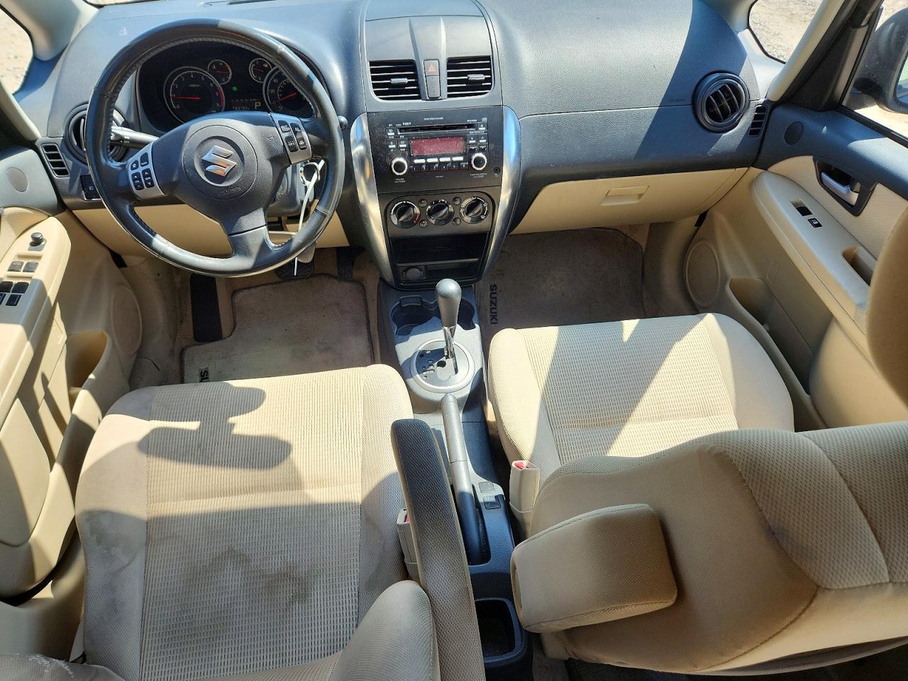 2012 Suzuki Sx4 Le Gray vin: JS2YC5A32C6300677