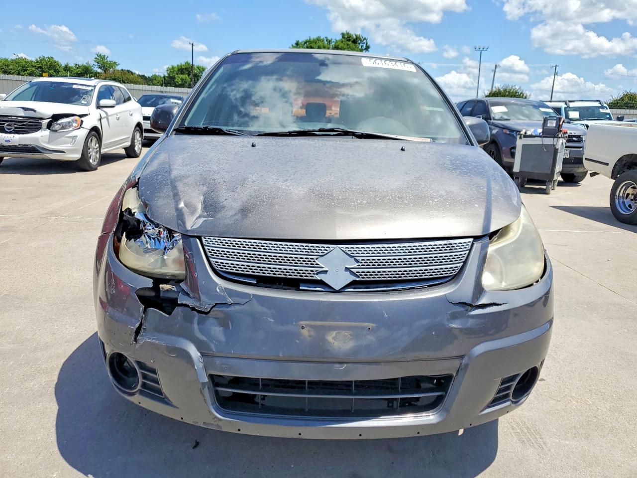 2012 Suzuki Sx4 Le Gray vin: JS2YC5A33C6304060