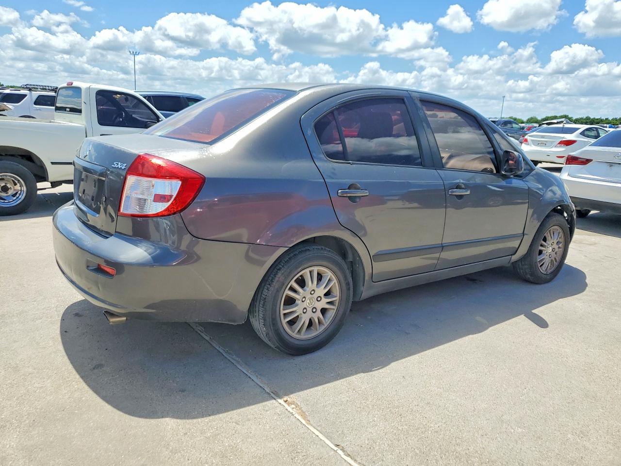 2012 Suzuki Sx4 Le Gray vin: JS2YC5A33C6304060
