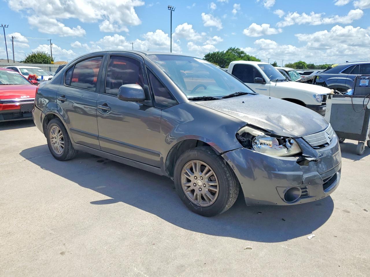 2012 Suzuki Sx4 Le Gray vin: JS2YC5A33C6304060