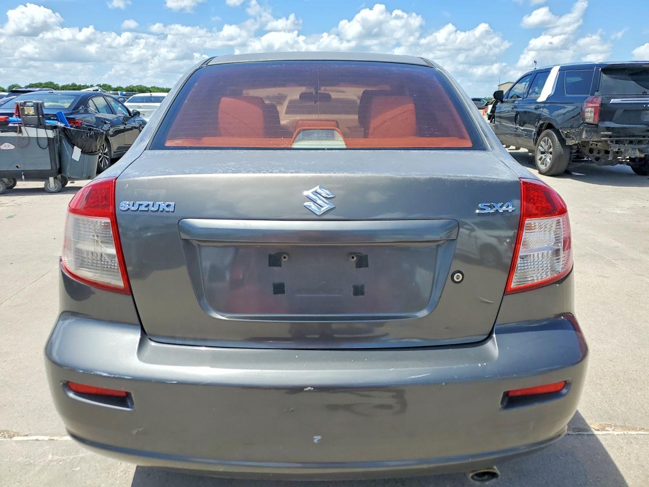 2012 Suzuki Sx4 Le Gray vin: JS2YC5A33C6304060