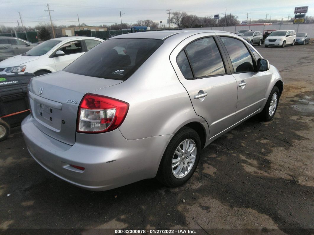 2013 Suzuki Sx4 Le Popular Silver vin: JS2YC5A33D6100537