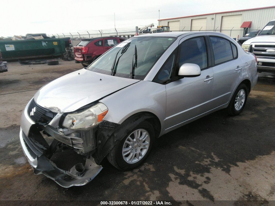 2013 Suzuki Sx4 Le Popular Silver vin: JS2YC5A33D6100537
