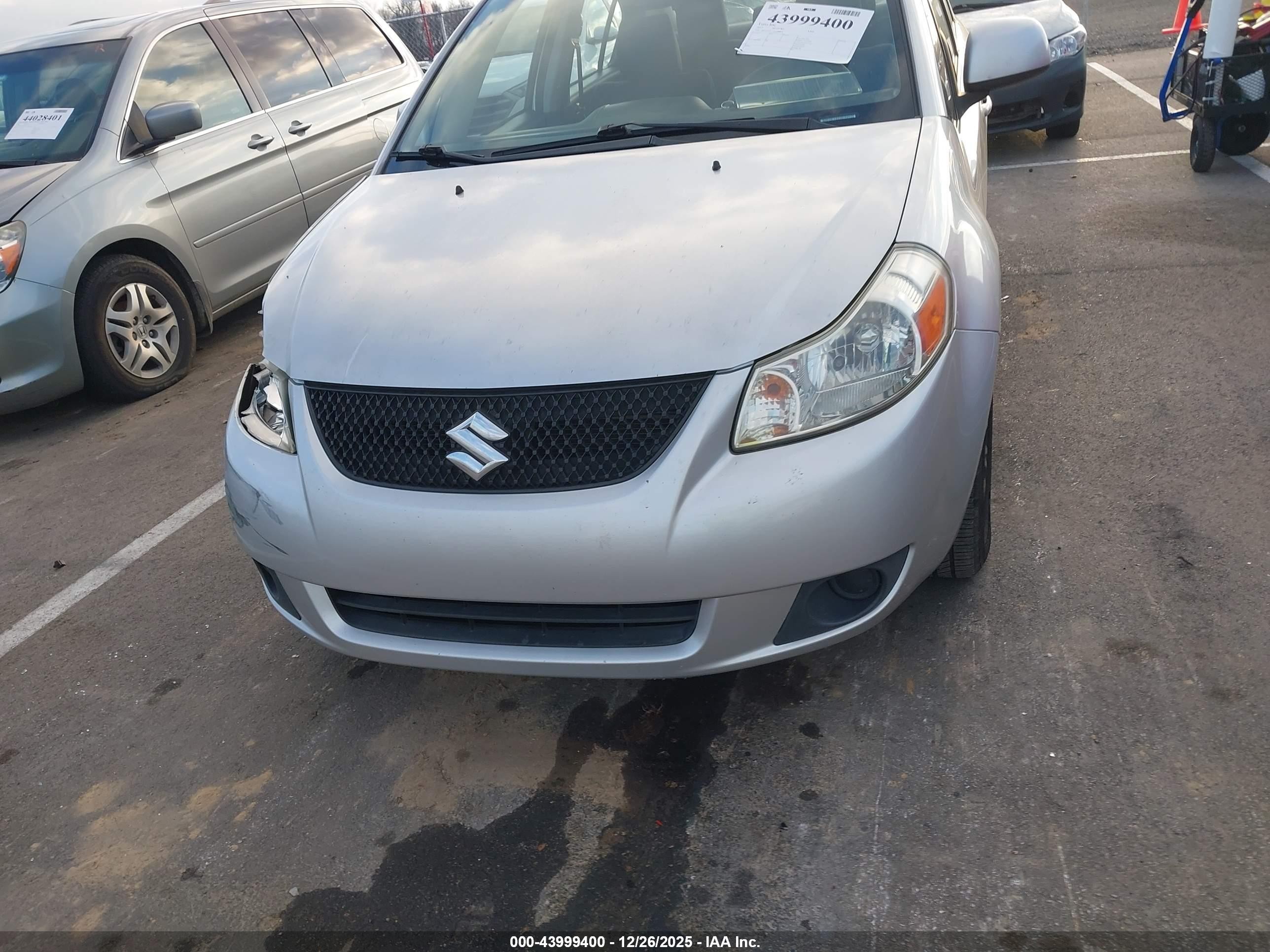 2013 Suzuki Sx4 Le/le Popular Silver vin: JS2YC5A33D6100814