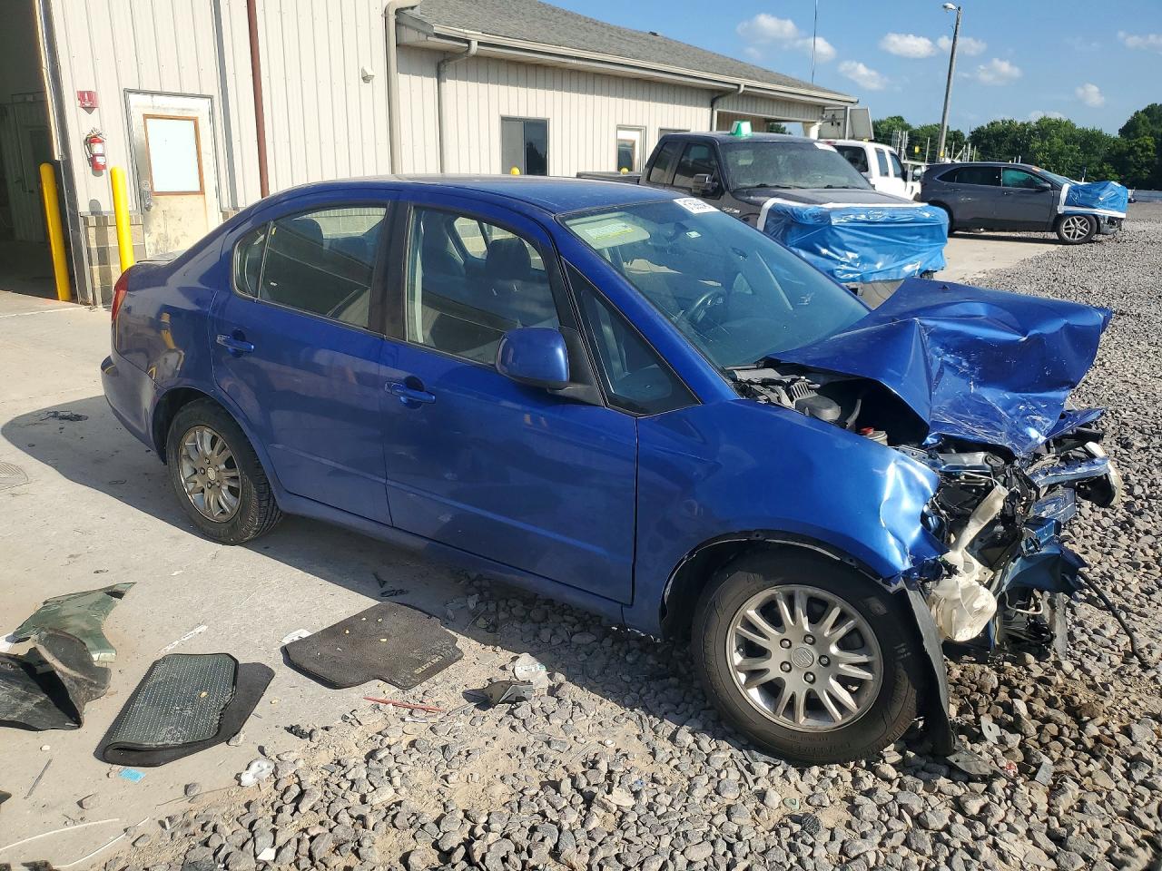 2013 Suzuki Sx4 Le Blue vin: JS2YC5A35D6101298