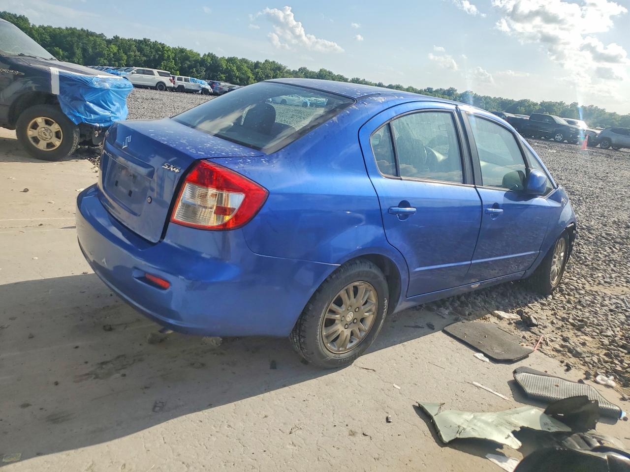 2013 Suzuki Sx4 Le Blue vin: JS2YC5A35D6101298
