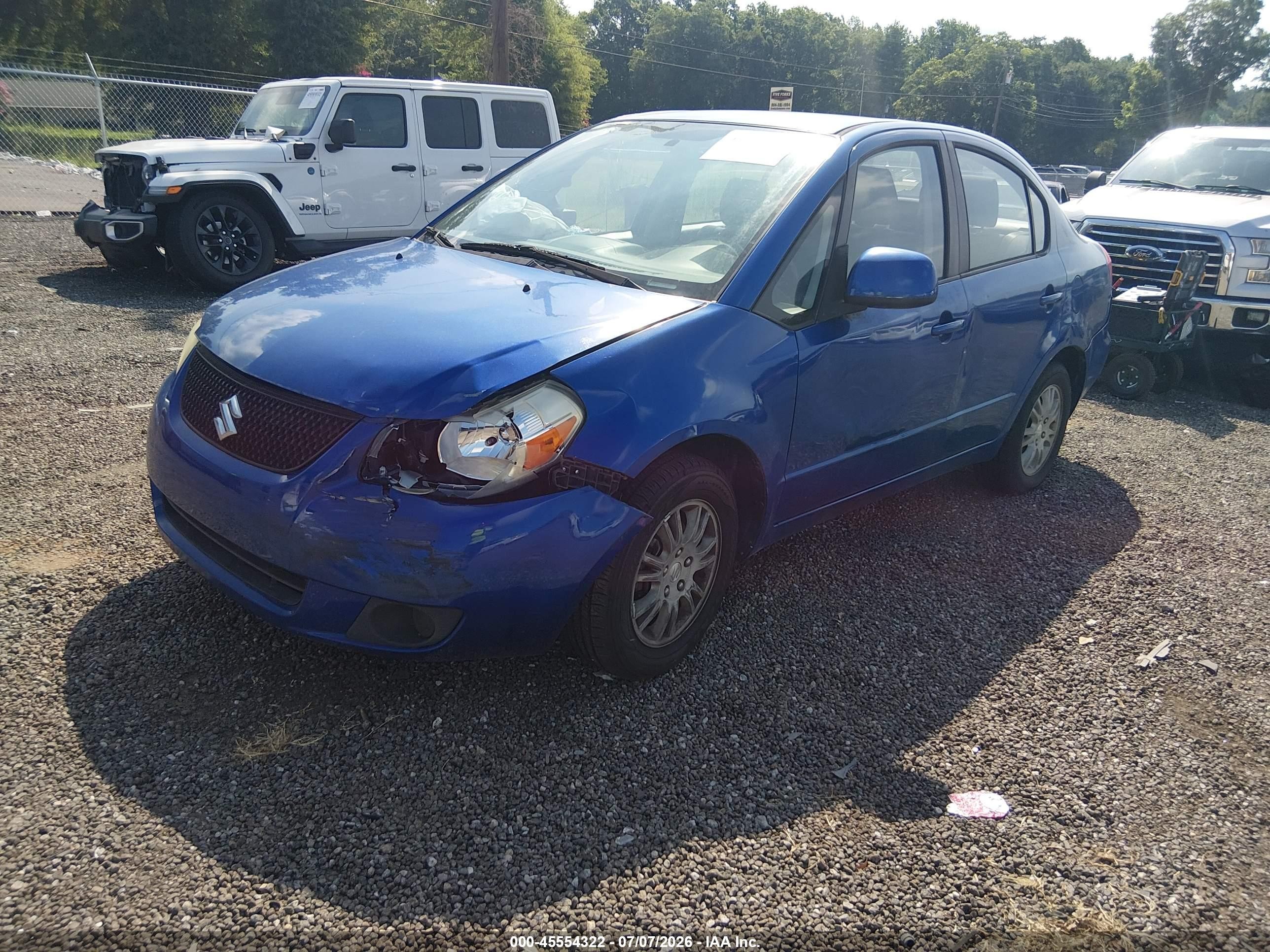 2013 Suzuki Sx4 Le/le Popular Blue vin: JS2YC5A39D6101157