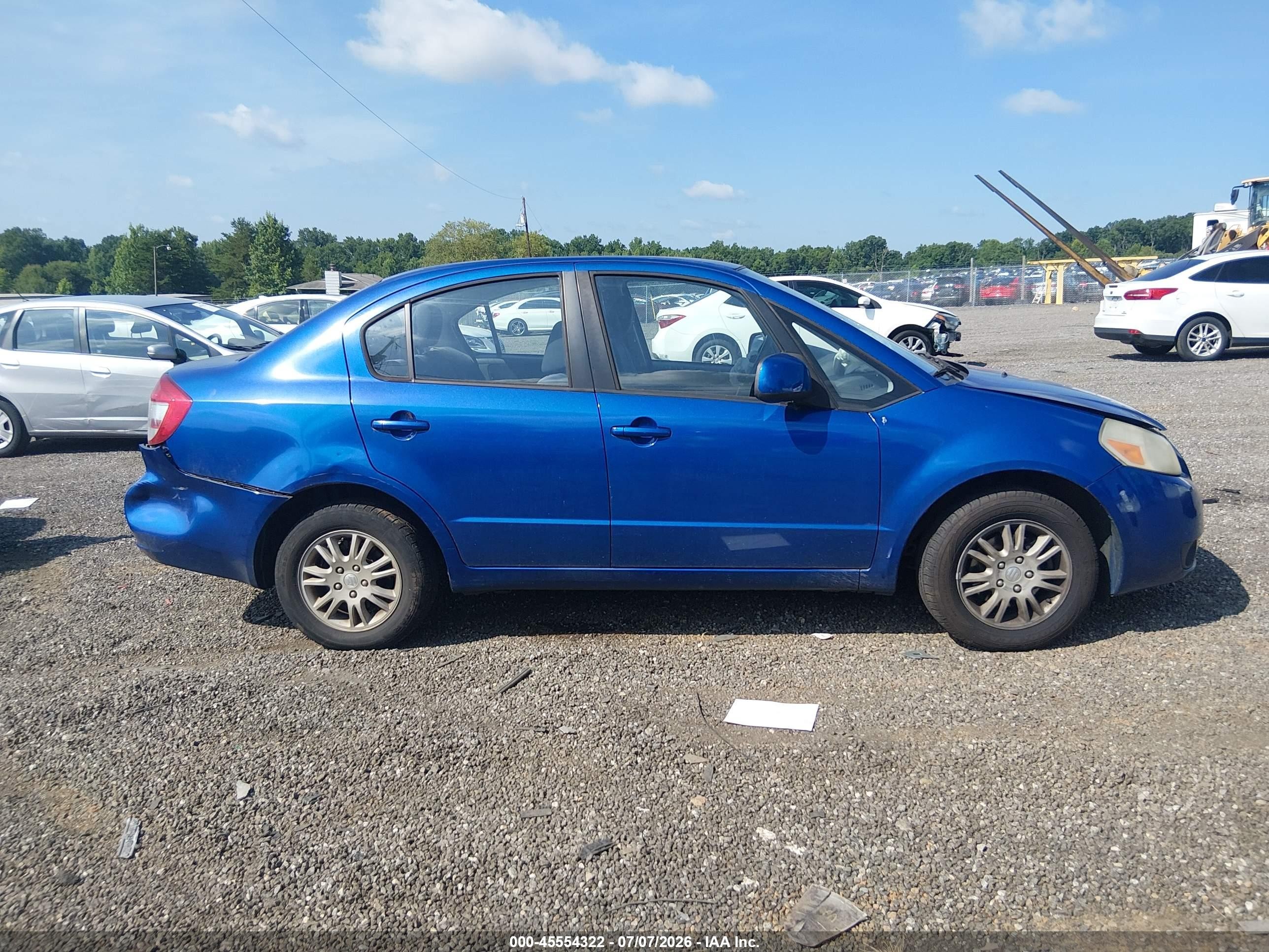 2013 Suzuki Sx4 Le/le Popular Blue vin: JS2YC5A39D6101157