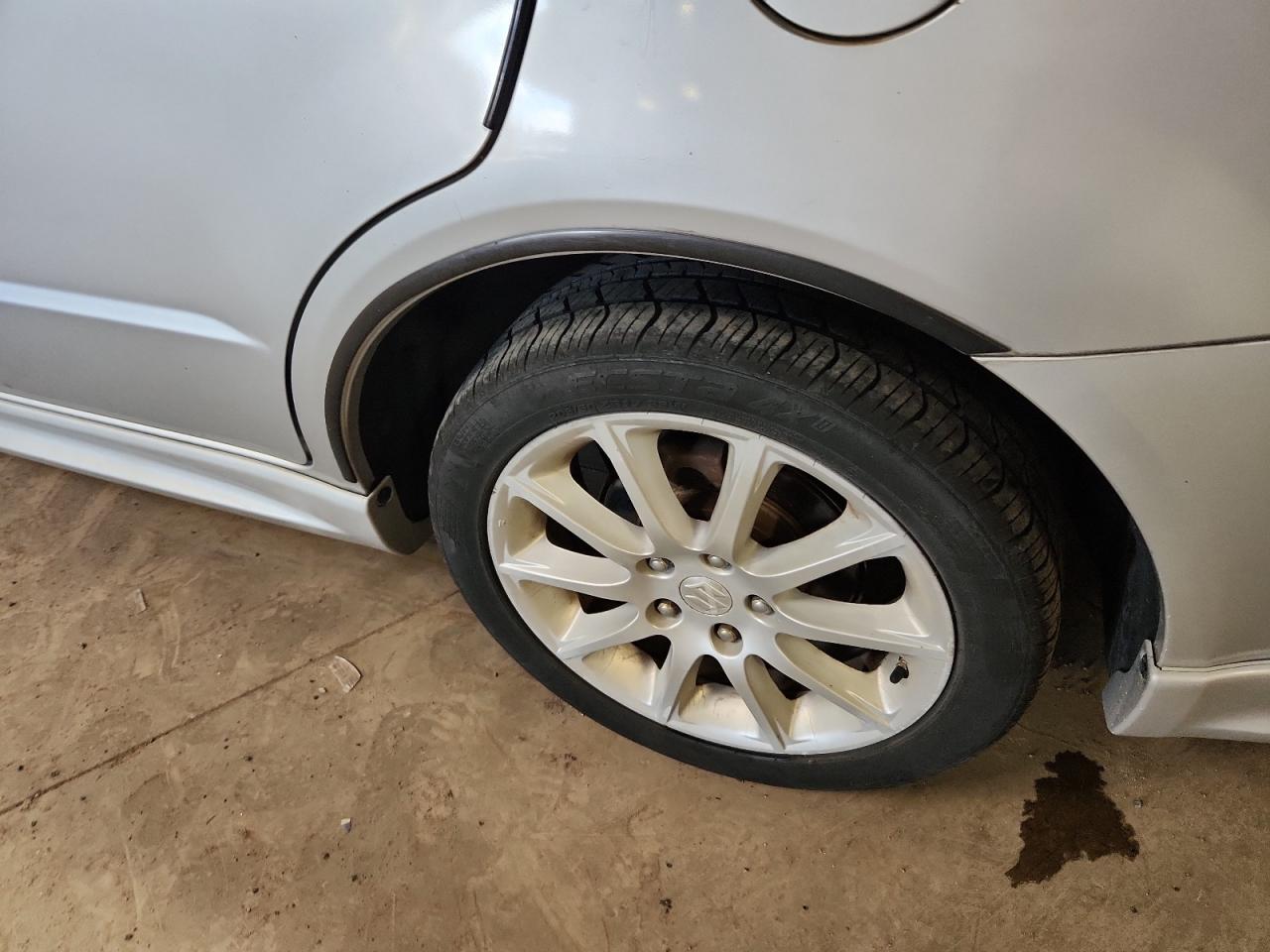 2011 Suzuki Sx4 Sport Silver vin: JS2YC5A42B6300458 Damage: Left Rear Wheel, Curb Rash, 1/8 To 1/2 Inch