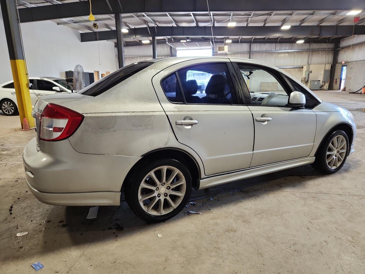 2011 Suzuki Sx4 Sport Silver vin: JS2YC5A42B6300458 Damage: Right Qtr Panel, Previous Repair, Substandard Repair