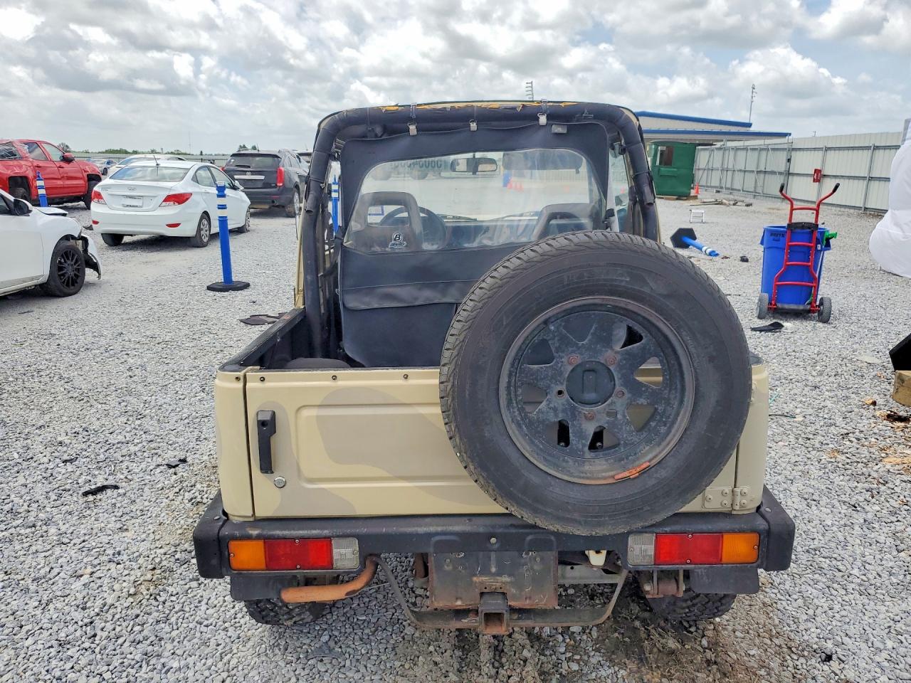 1987 Suzuki Samurai Tan vin: JS3JC51C9H4194227