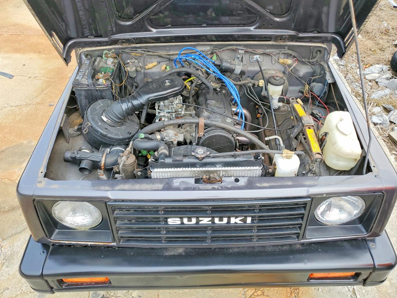 1986 Suzuki Samurai Black vin: JS3JC51V8G4110639