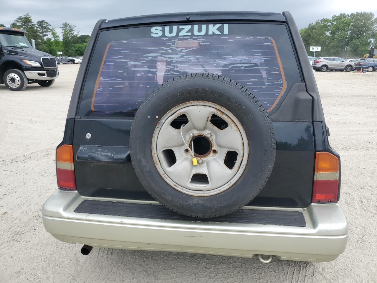 1998 Suzuki Sidekick Sport Jx   Black vin: JS3TD21V7W4104866