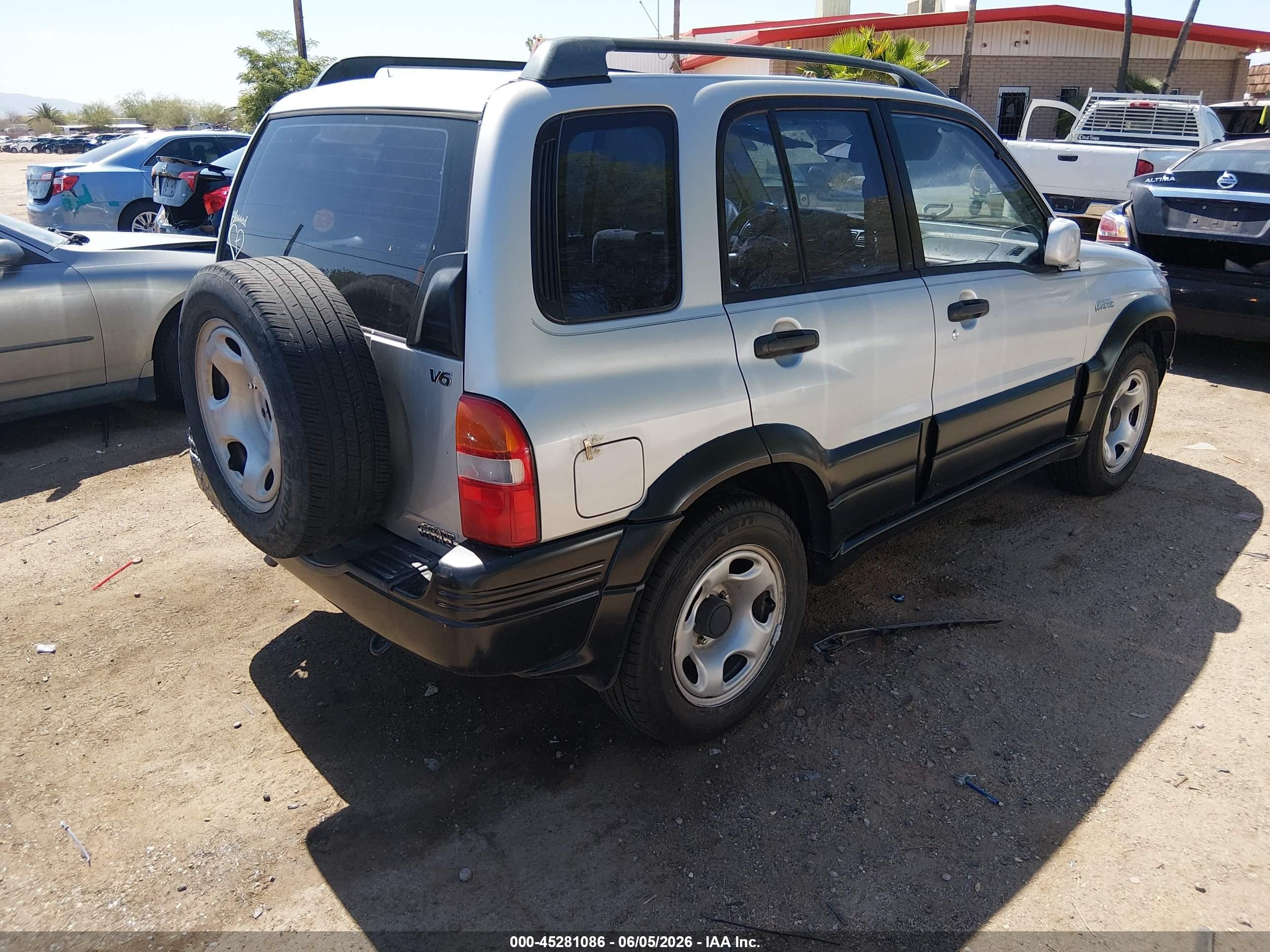 1999 Suzuki Grand Vitara Jlx/jlx+ Silver vin: JS3TD62V8X4113079