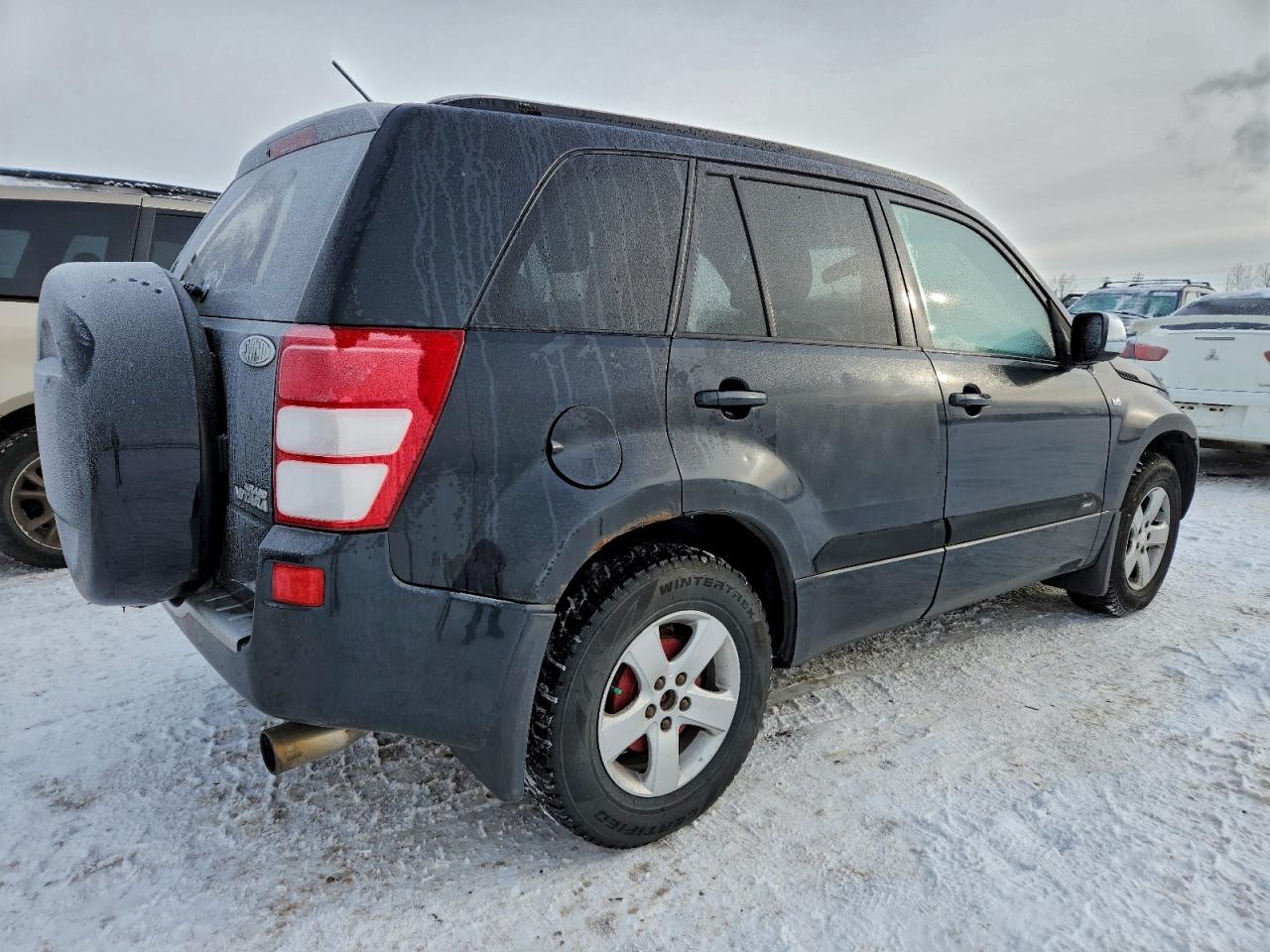 2006 Suzuki Grand Vitara Premium Black vin: JS3TD943264103904