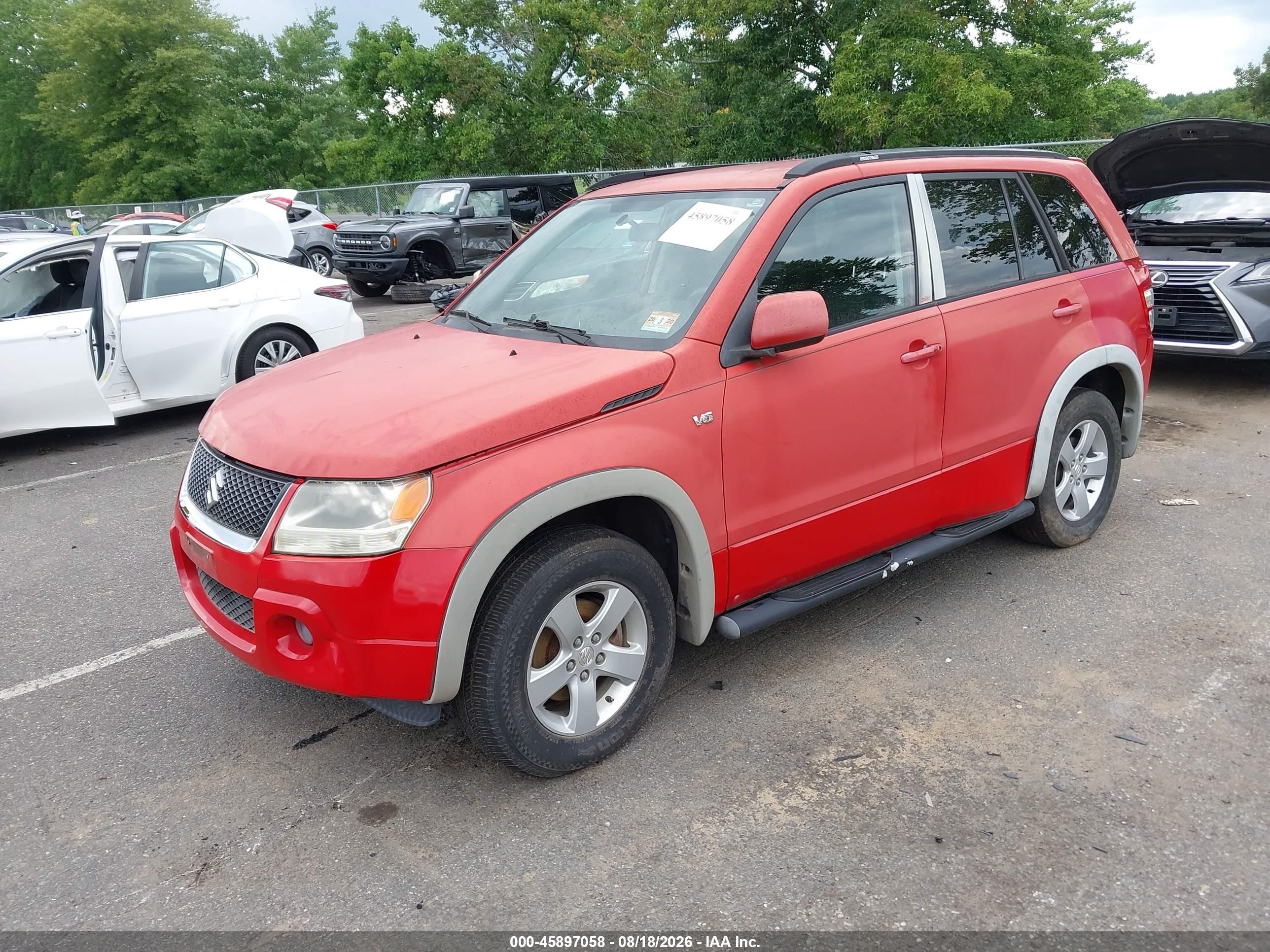 2006 Suzuki Grand Vitara Xsport Red vin: JS3TD944164100470