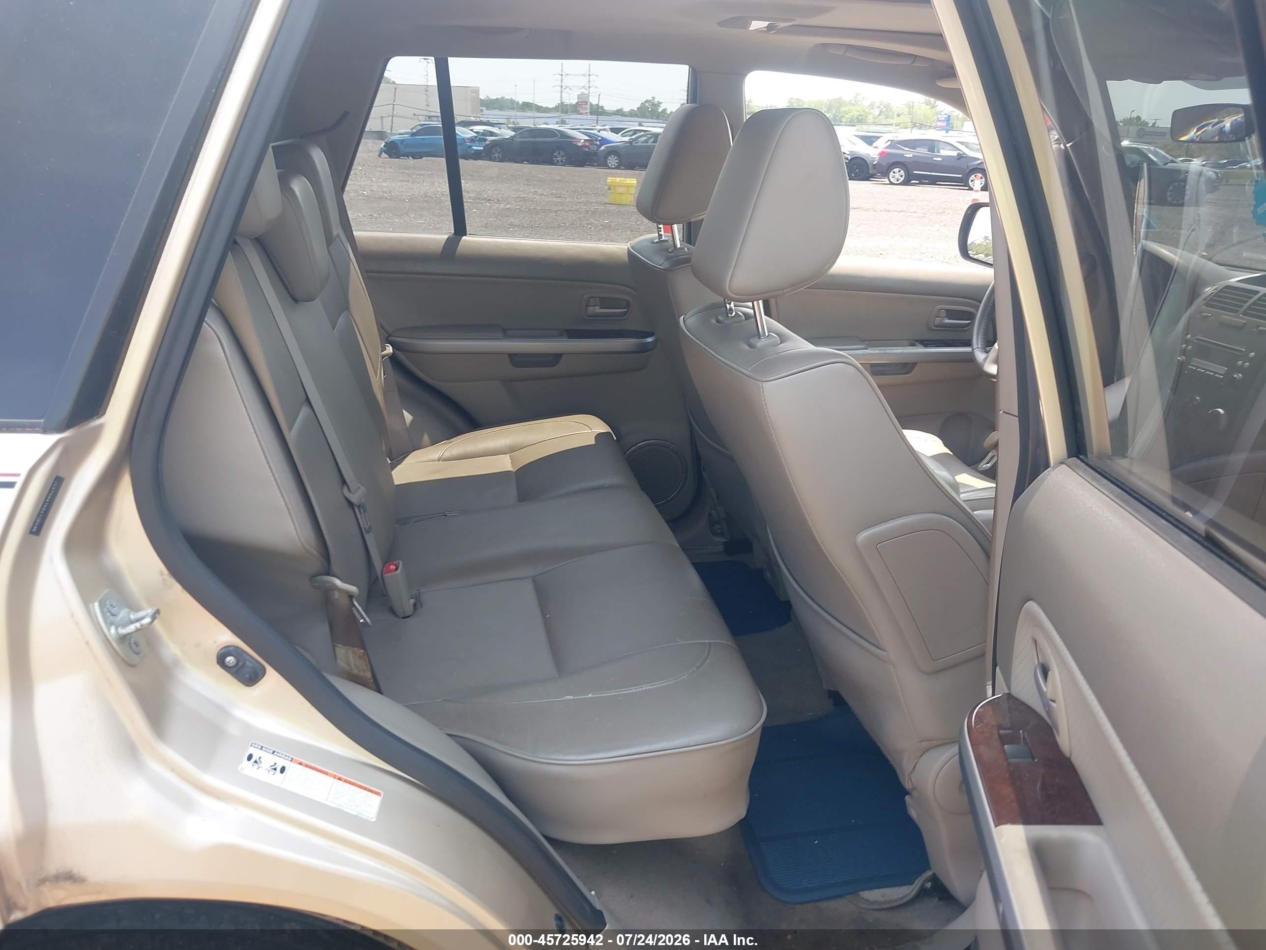 2006 Suzuki Grand Vitara Luxury Gold vin: JS3TD947X64106598