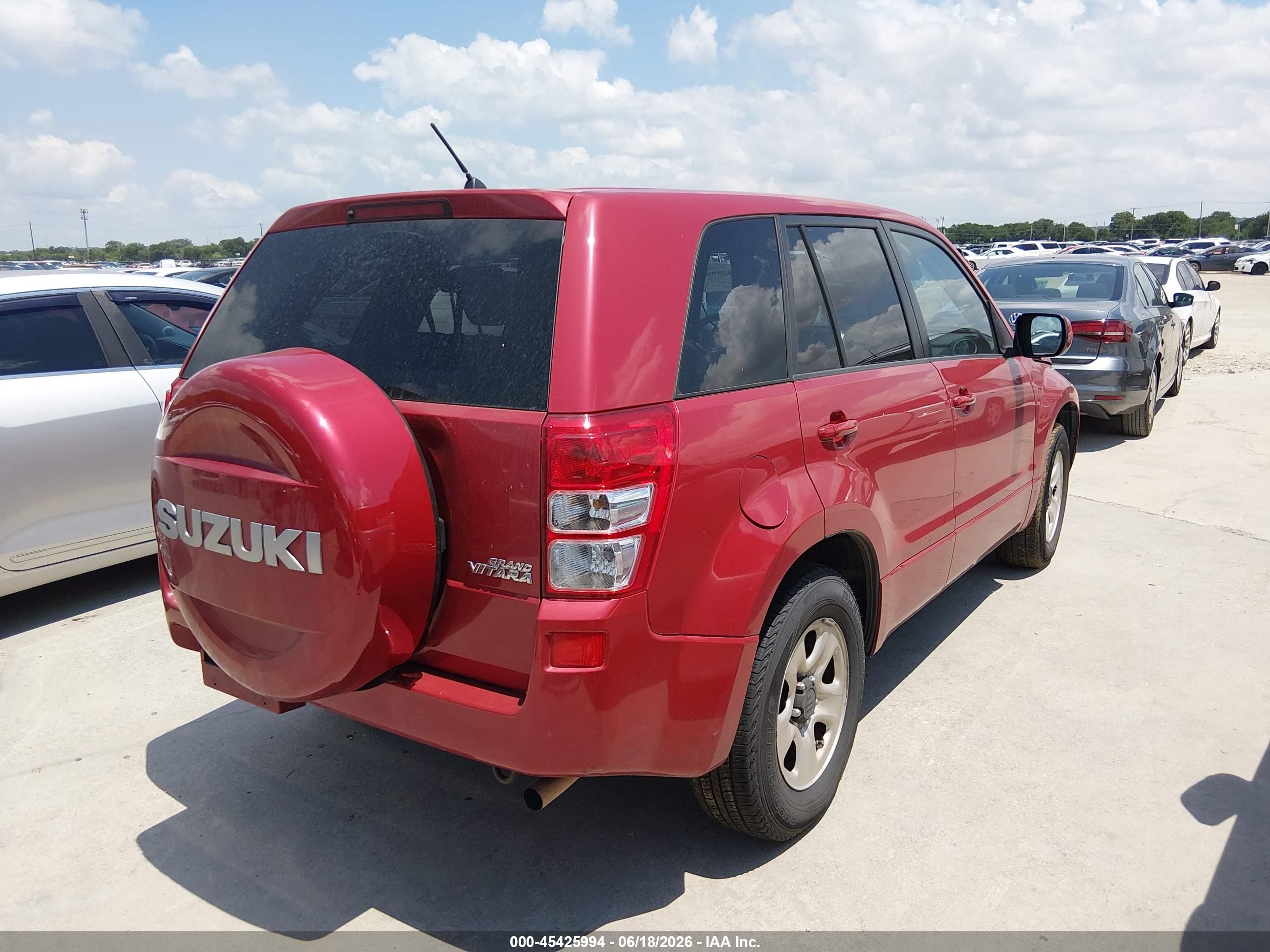 2010 Suzuki Grand Vitara Premium Red vin: JS3TE0D22A4100249