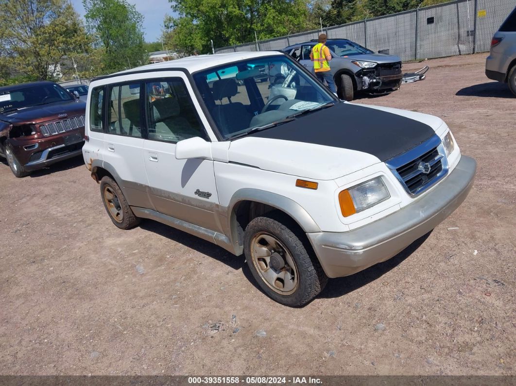 JS3TE21VXW4100405 — 1998 SUZUKI SIDEKICK History & VIN | AutoHelperBot