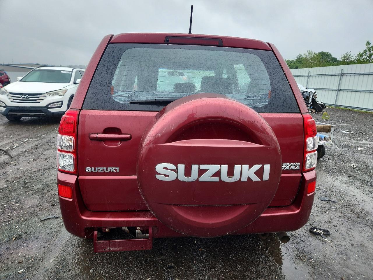 2007 Suzuki Grand Vitara Red vin: JS3TE941X74201477