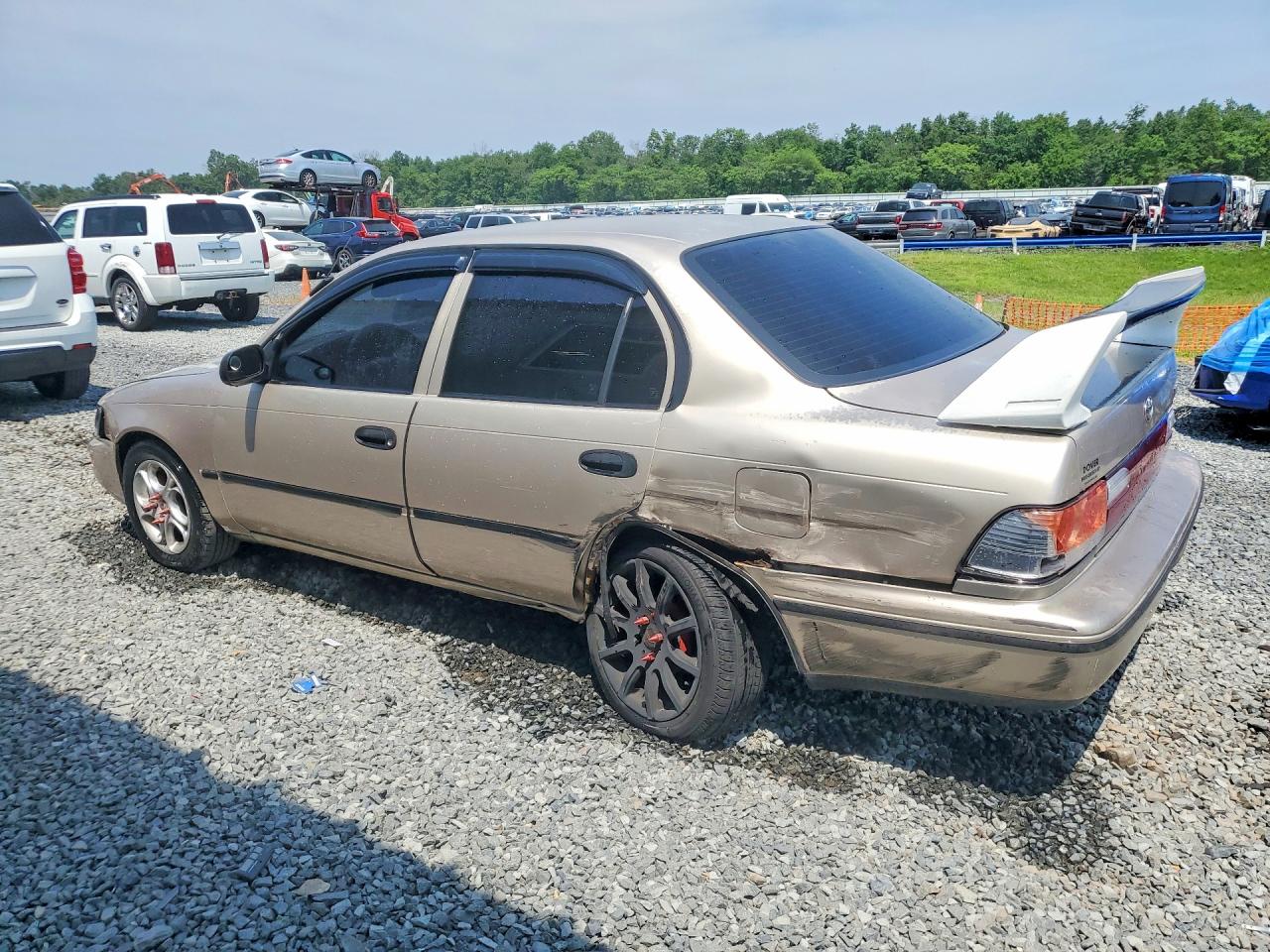 1994 Toyota Corolla Base Tan vin: JT2AE04B9R0086836