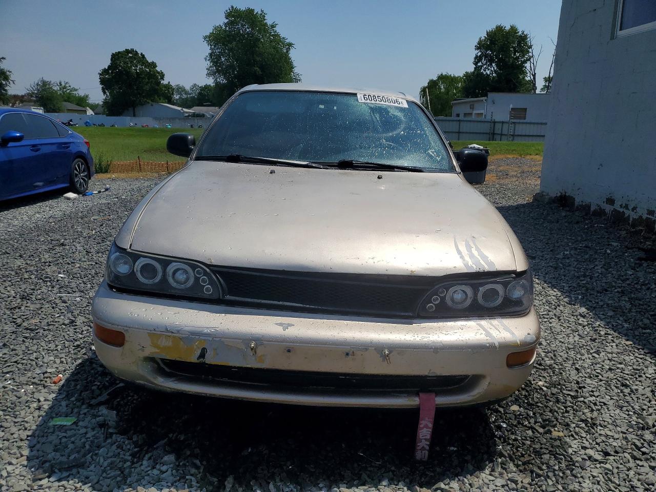 1994 Toyota Corolla Base Tan vin: JT2AE04B9R0086836