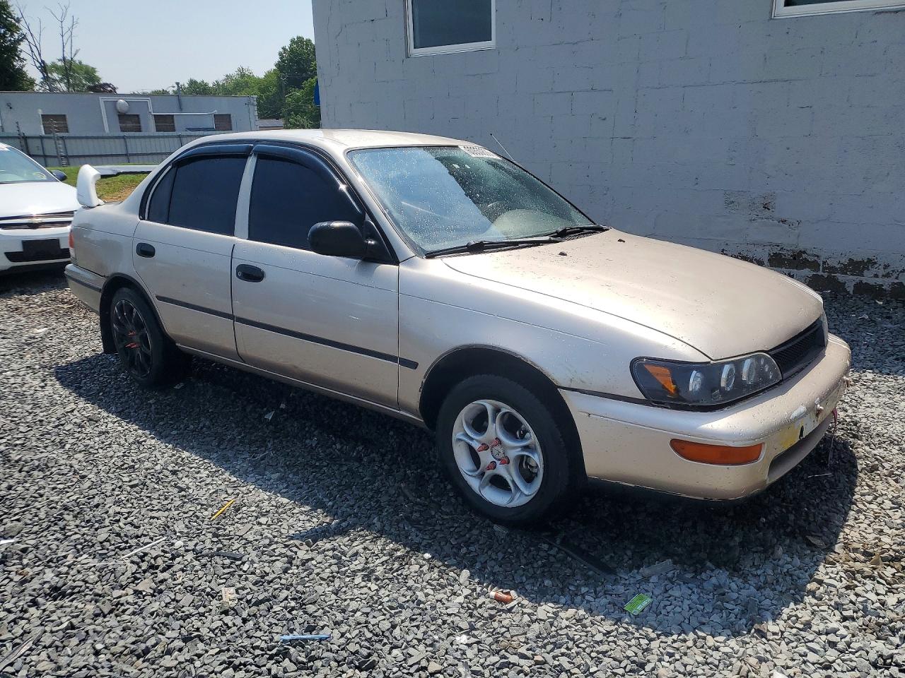 1994 Toyota Corolla Base Tan vin: JT2AE04B9R0086836
