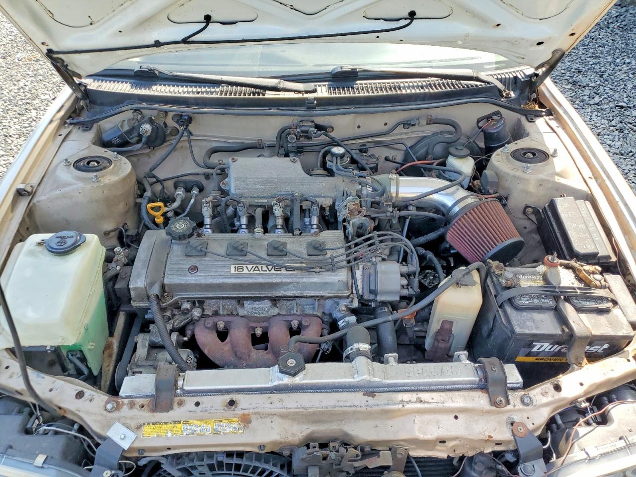 1994 Toyota Corolla Base Tan vin: JT2AE04B9R0086836