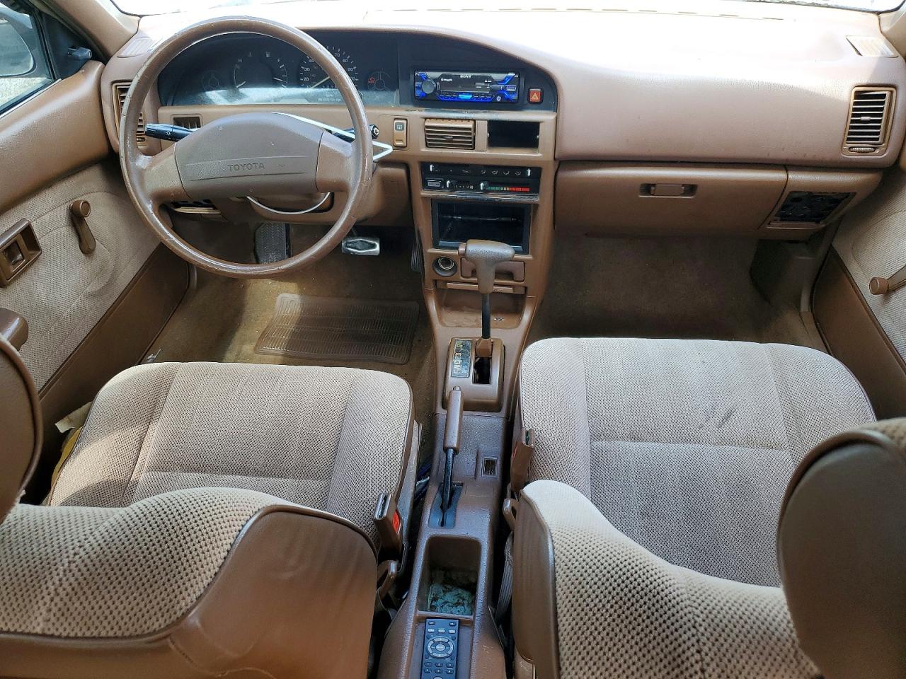 1991 Toyota Corolla Deluxe Beige vin: JT2AE94A3M3477404