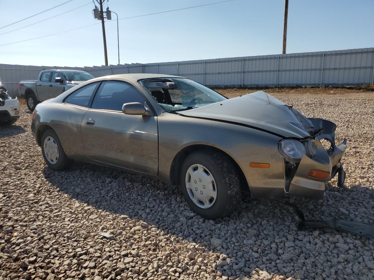 1994 Toyota Celica Base Tan vin: JT2AT00N8R0027427