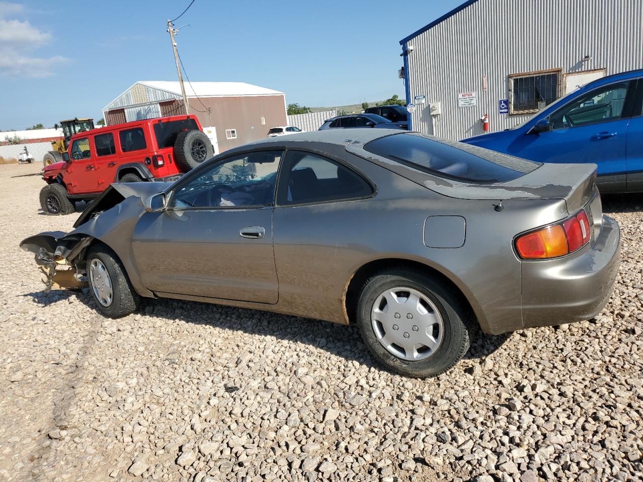 1994 Toyota Celica Base Tan vin: JT2AT00N8R0027427