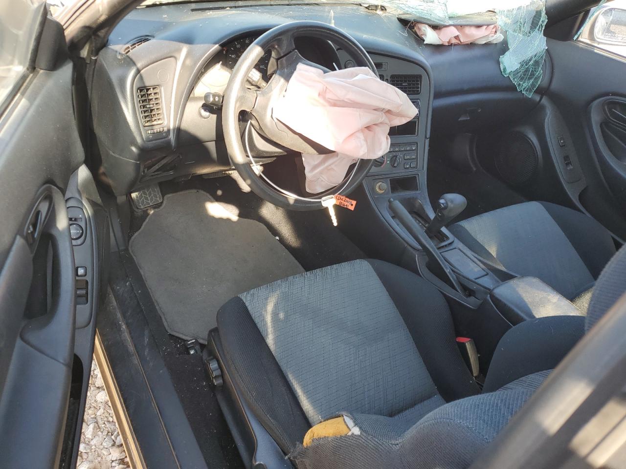 1994 Toyota Celica Base Tan vin: JT2AT00N8R0027427