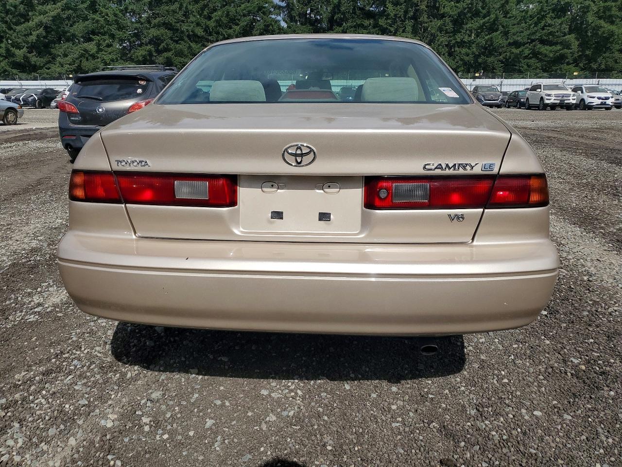 1999 Toyota Camry Le Tan vin: JT2BF22K5X0162744