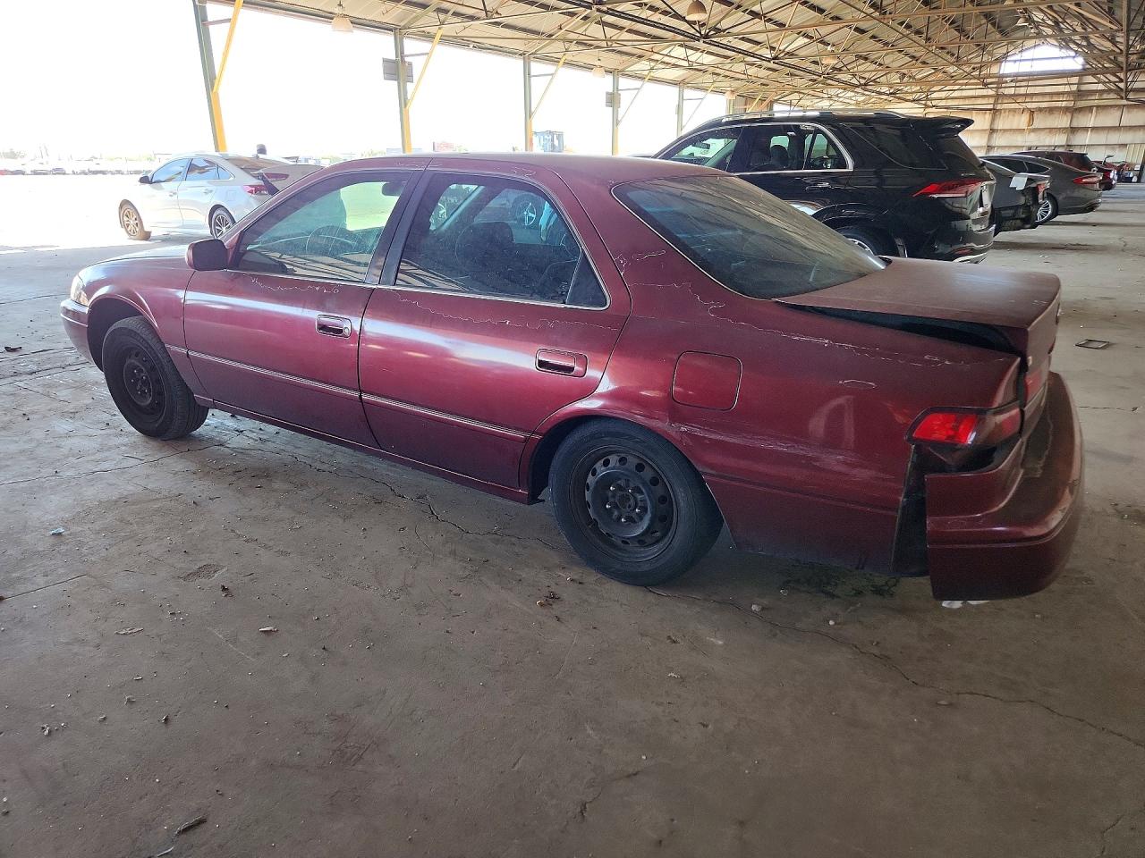 1999 Toyota Camry Le Red vin: JT2BG22K6X0354350
