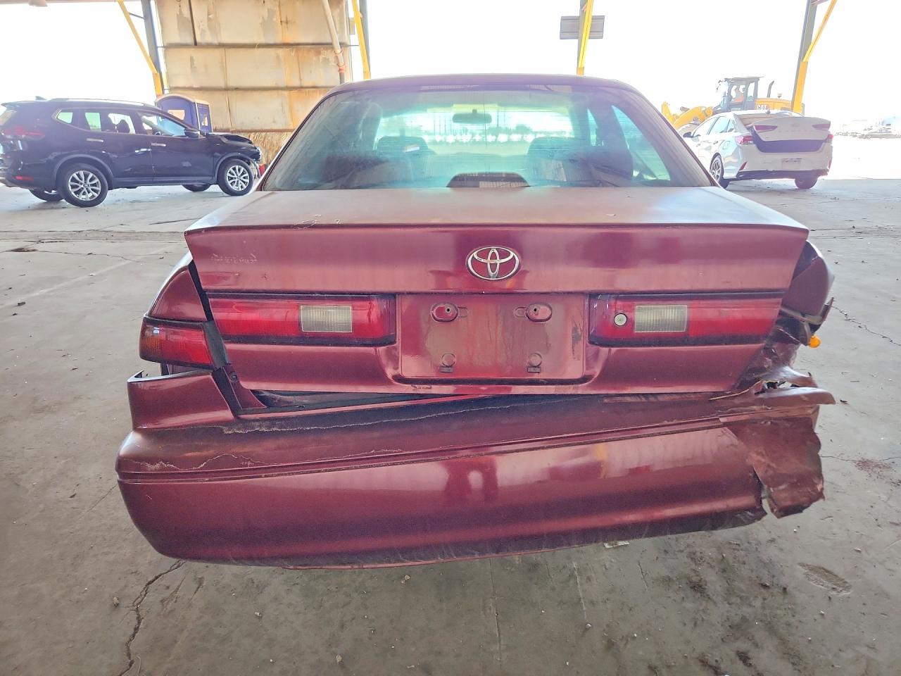 1999 Toyota Camry Le Red vin: JT2BG22K6X0354350