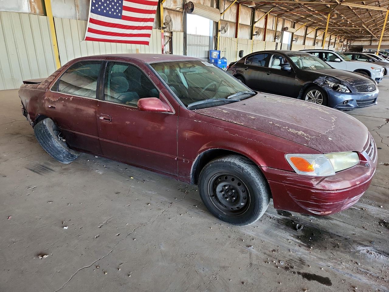 1999 Toyota Camry Le Red vin: JT2BG22K6X0354350