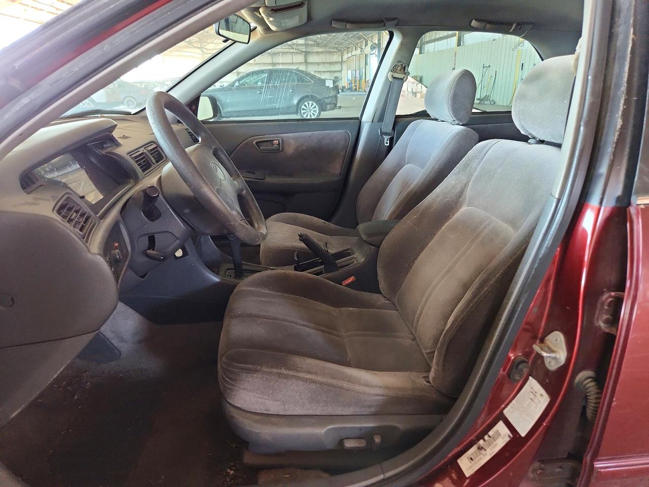 1999 Toyota Camry Le Red vin: JT2BG22K6X0354350