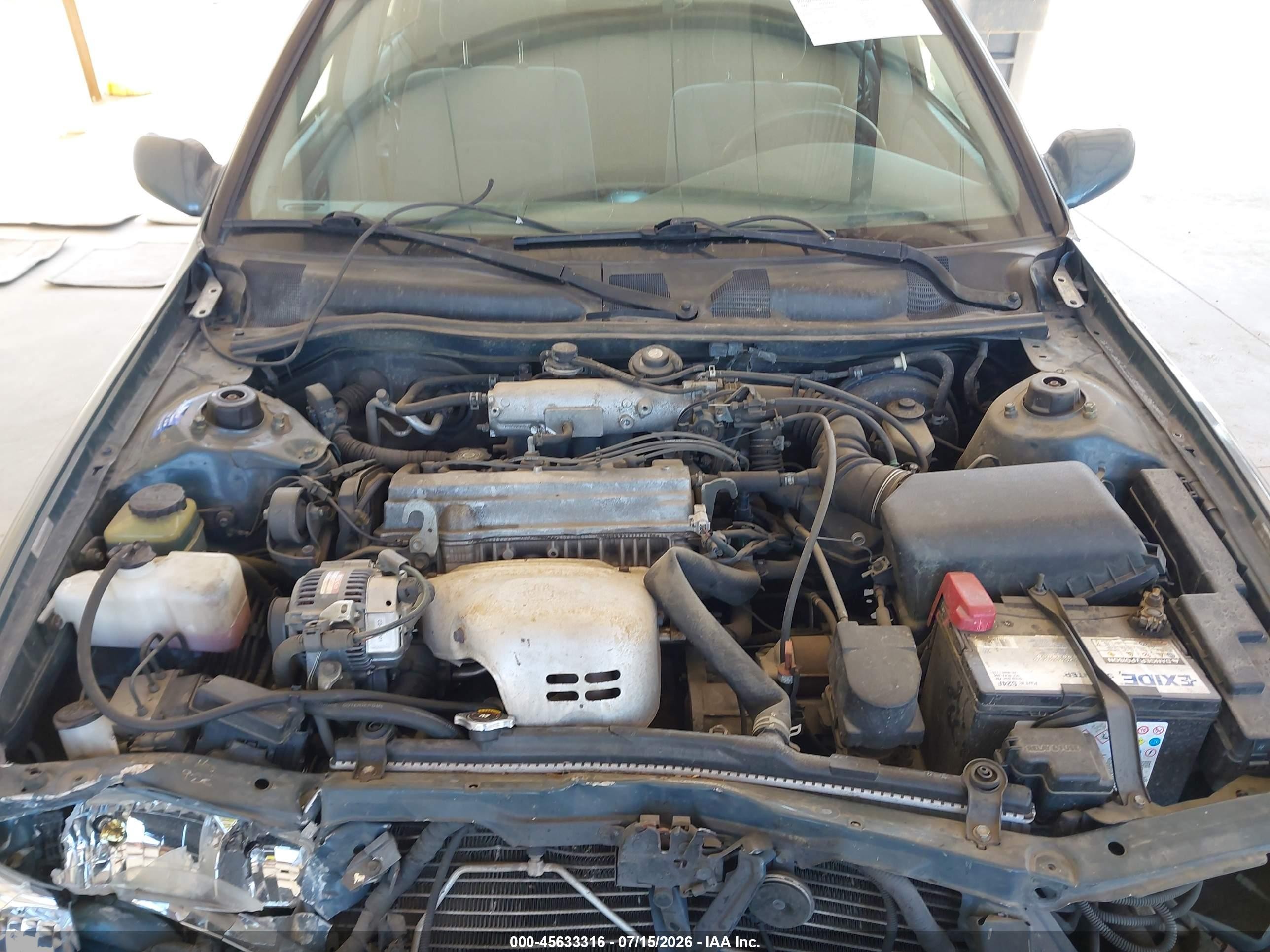 2000 Toyota Camry Le Green vin: JT2BG22K7Y0409048