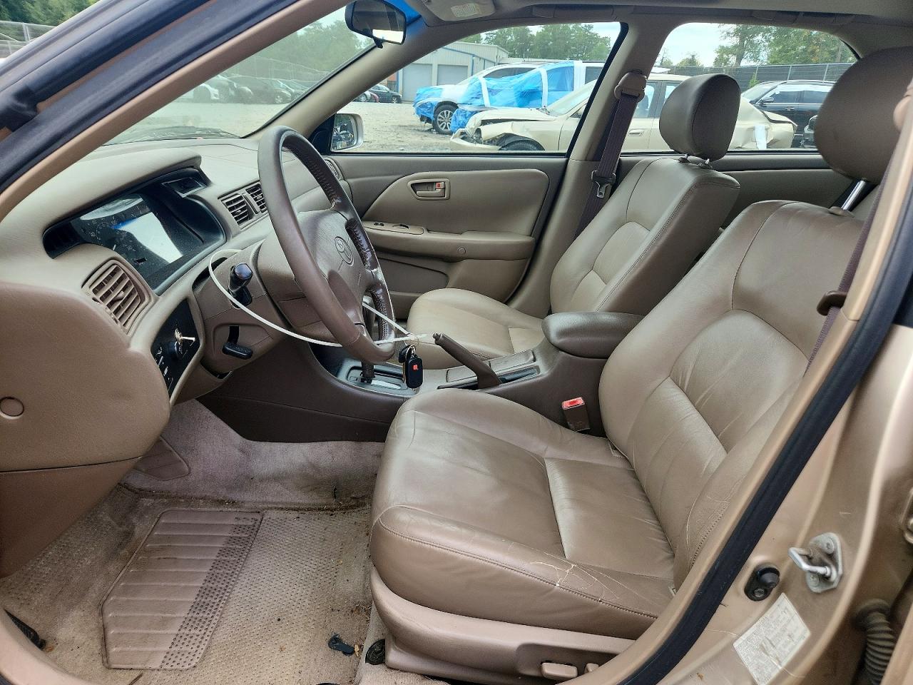 2000 Toyota Camry Le Tan vin: JT2BG22K7Y0419630