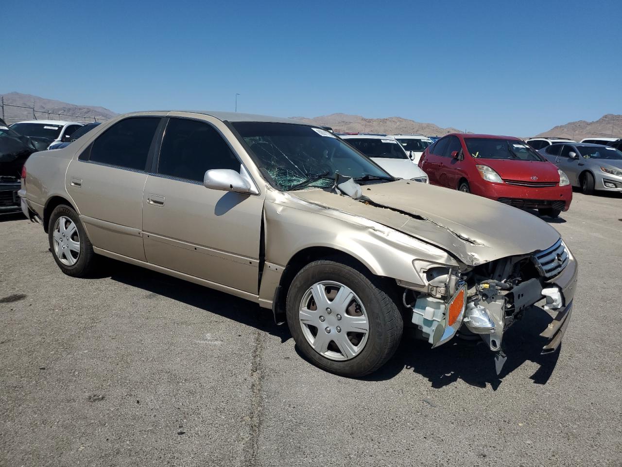 2000 Toyota Camry Le Gold vin: JT2BG22K7Y0476345