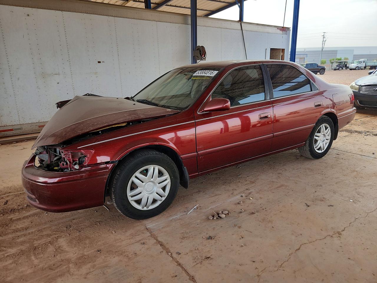 2000 Toyota Camry Le Red vin: JT2BG22K7Y0507643