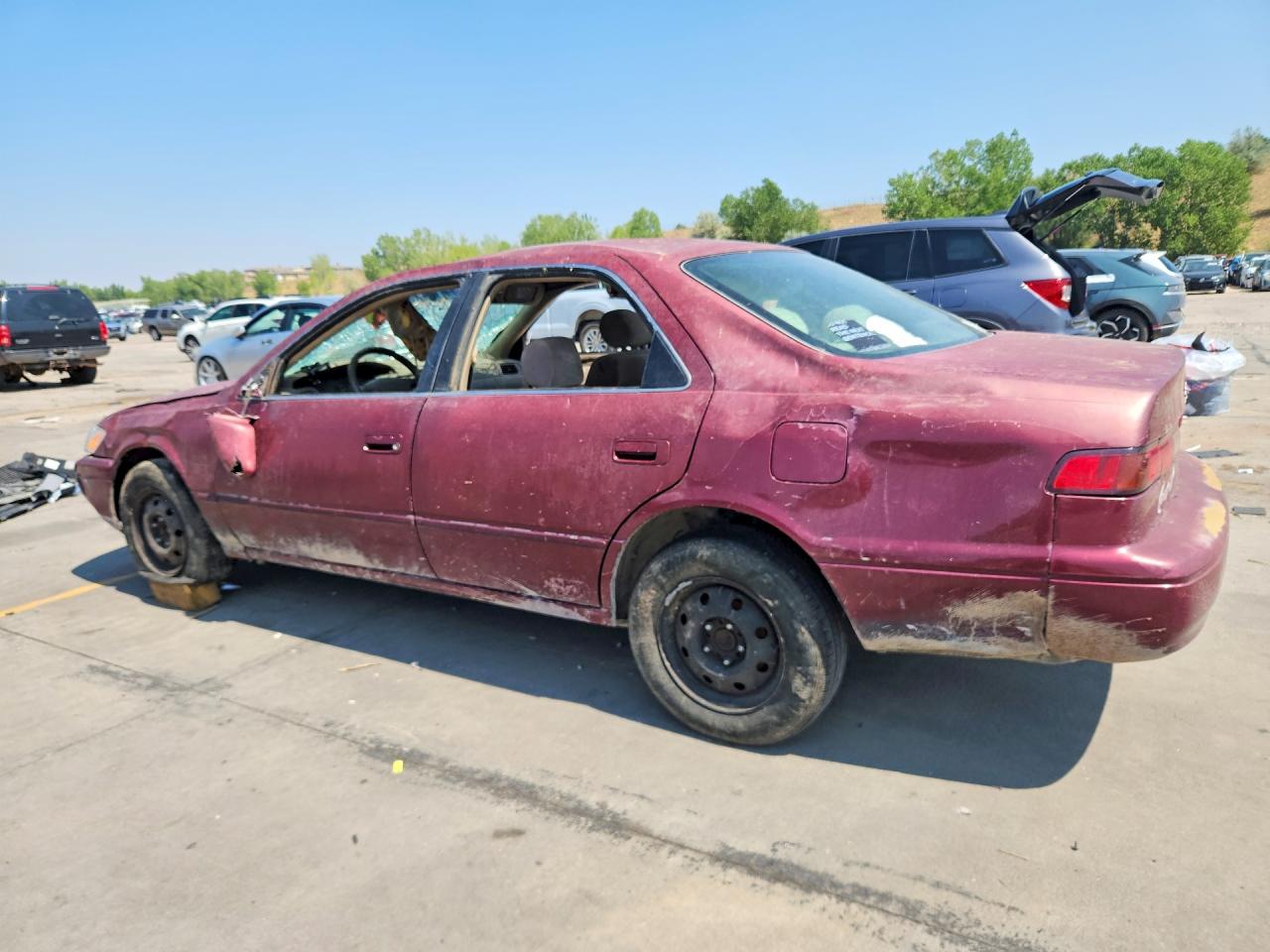 1998 Toyota Camry Le Burgundy vin: JT2BG22KXW0124891