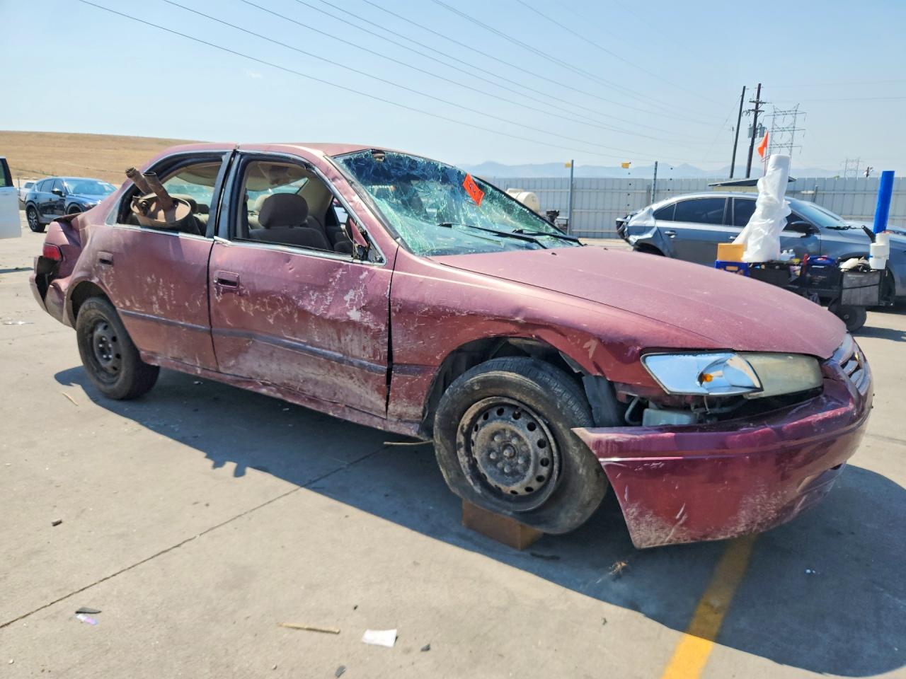 1998 Toyota Camry Le Burgundy vin: JT2BG22KXW0124891