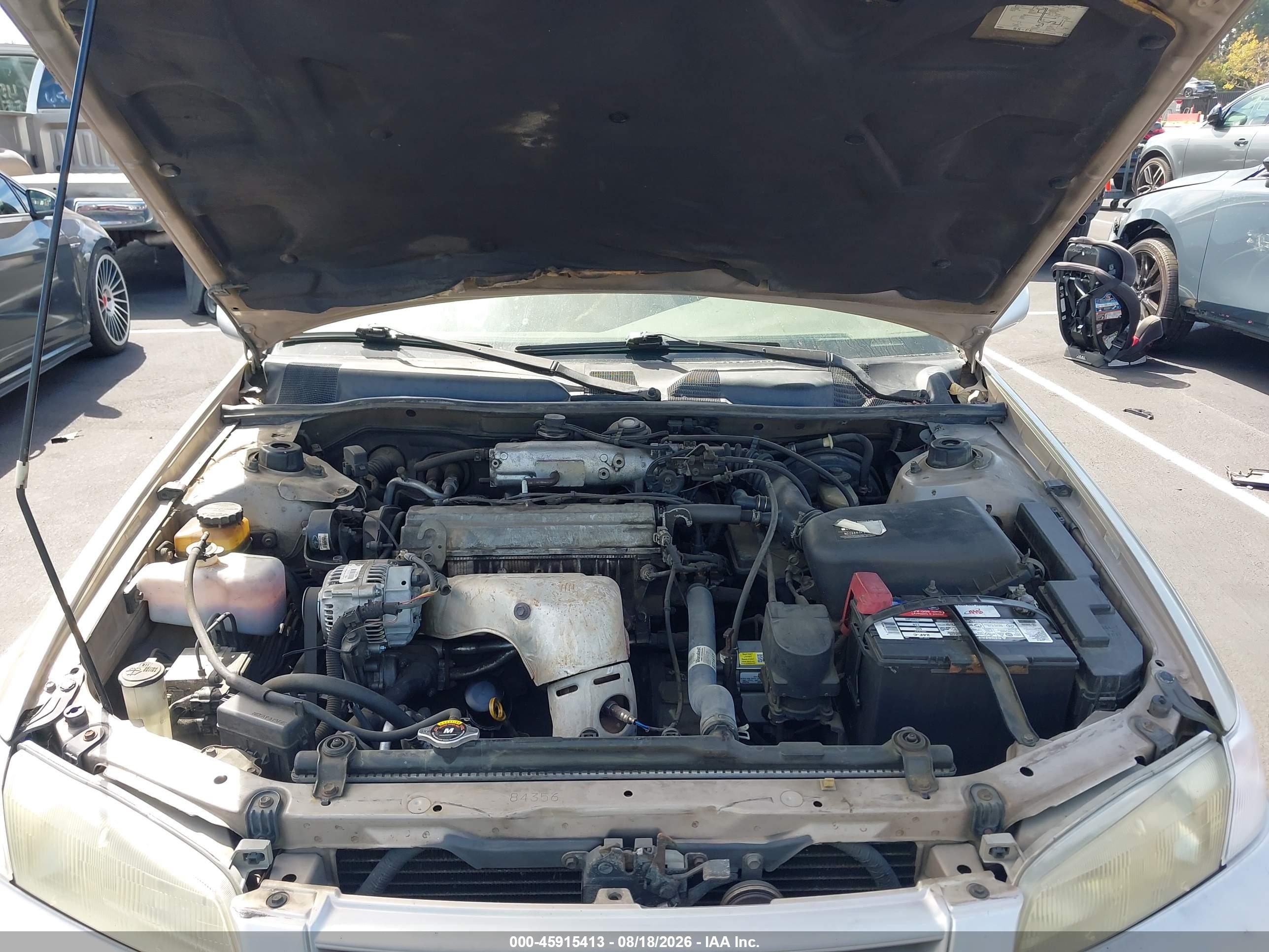 1998 Toyota Camry Le Золотой vin: JT2BG28K7W0215964
